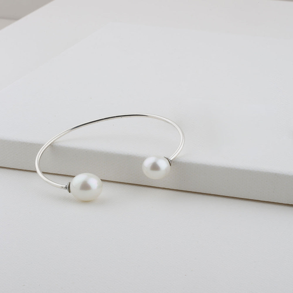 Girl With A Pearl Cuff