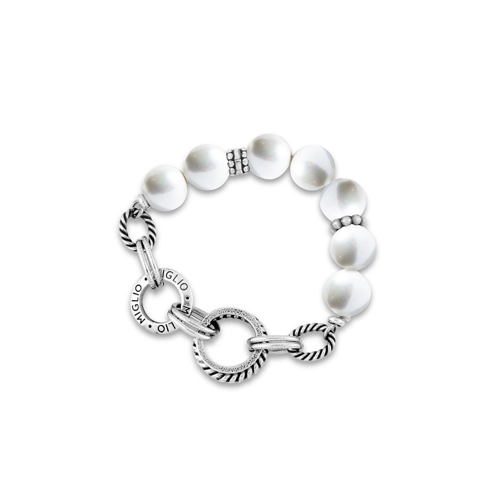 A Miglio burnished silver
Stretch bracelet with silver-tone hardware and white pearl-like beads.