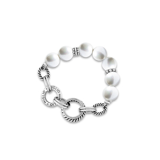 A Miglio burnished silver
Stretch bracelet with silver-tone hardware and white pearl-like beads.
