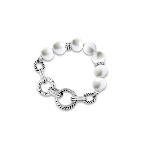A Pearl Lavida Stretch Bracelett with silver-tone hardware and white pearl-like beads,