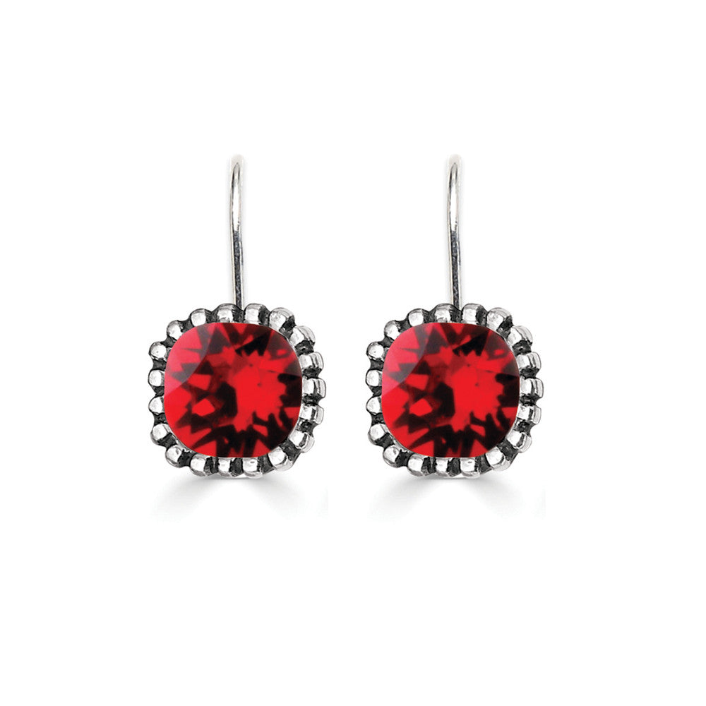 A pair of silver hook earrings with a red Swarovski crystal cushion centerpiece, crafted in a minimalistic style.