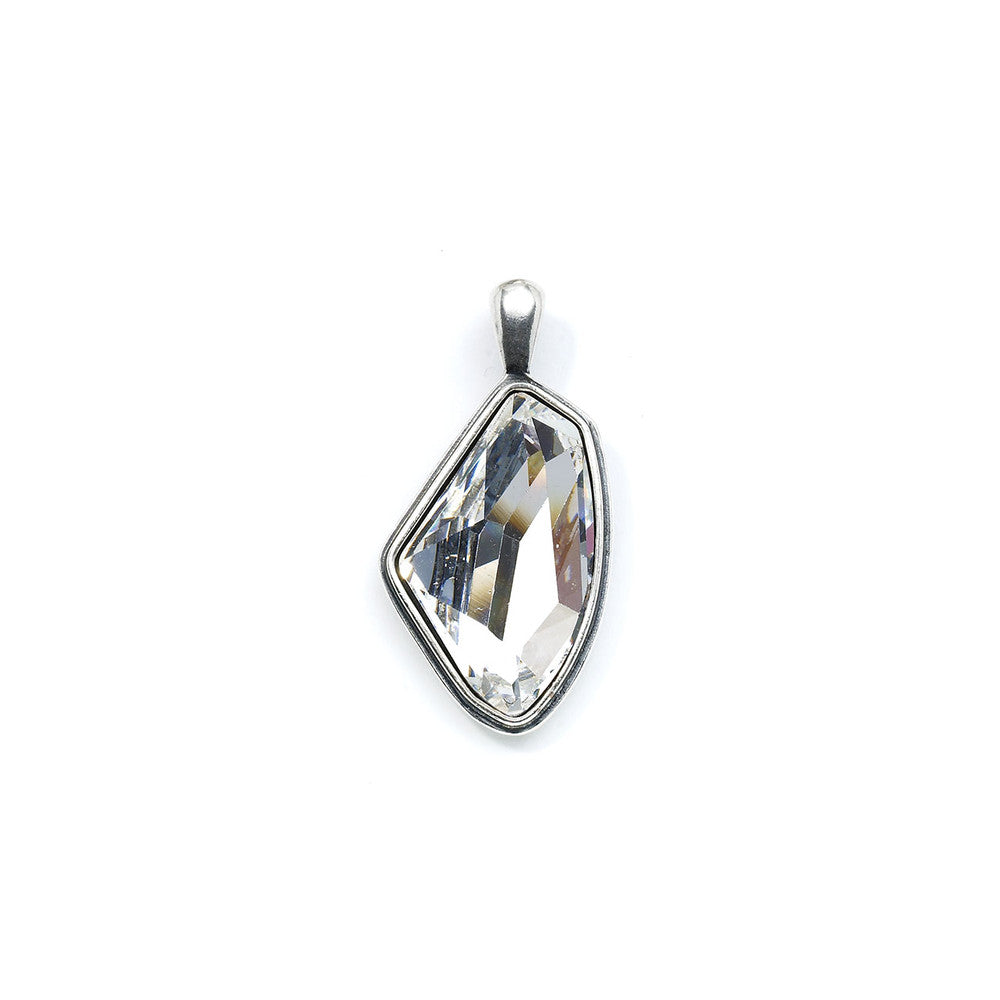 A geometrically shaped enhancer with a multi-faceted clear Swarovski crystal set in a burnished silver mounting.