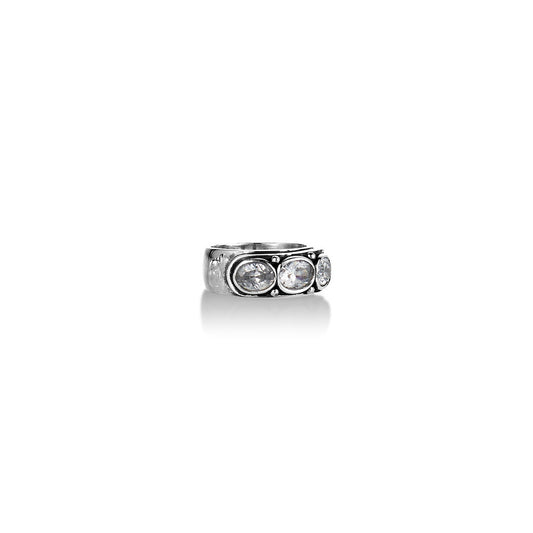 A Miglio sterling silver 925 Desire Trilogy ring with a trio of high quality AAA zirconia stones set in a triple bezel design.