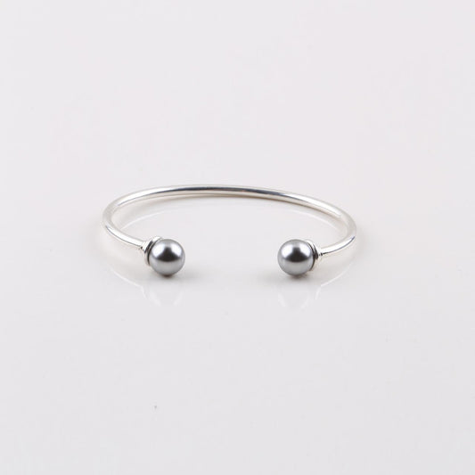 Sleek burnished silver plated open bangle with cool grey shell pearls - Size 64 mm / 67 mm