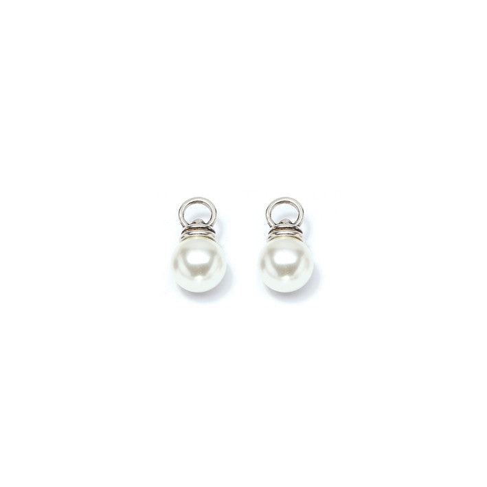 A pair of silver-Interchangeable earring charms with a pearl detail.