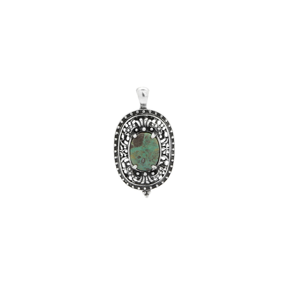 Oval-shaped pendant with green stone and silver frame on a white background