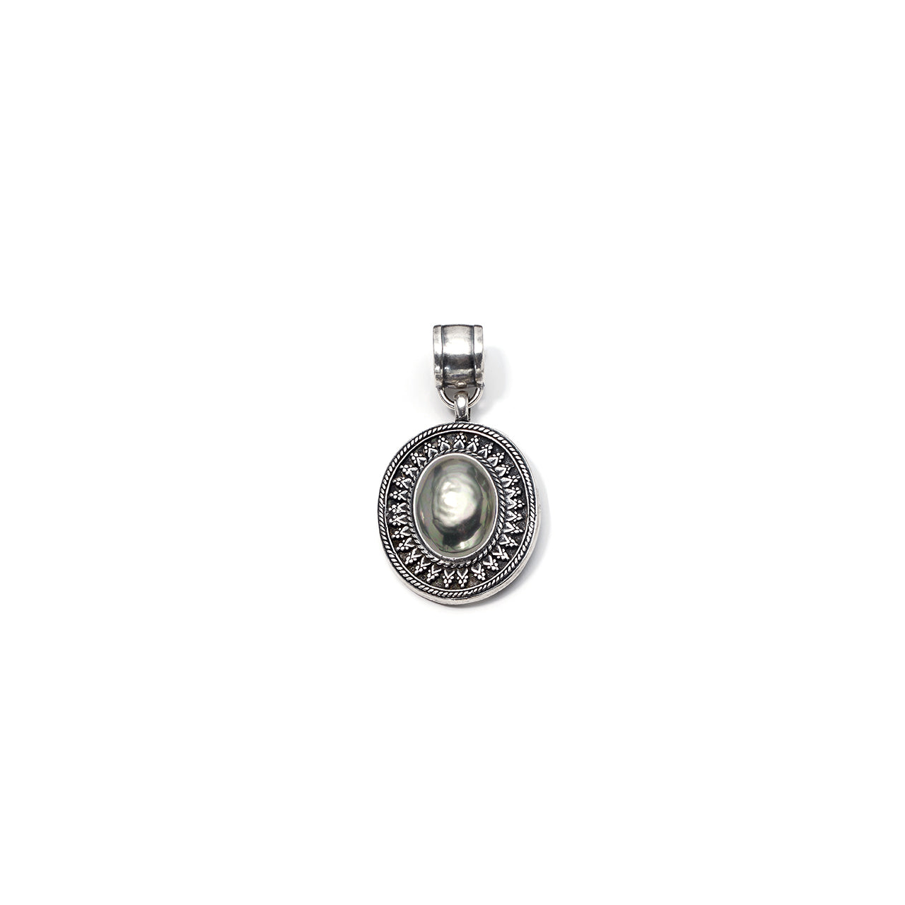 Silver pendant with a central gemstone on a white background