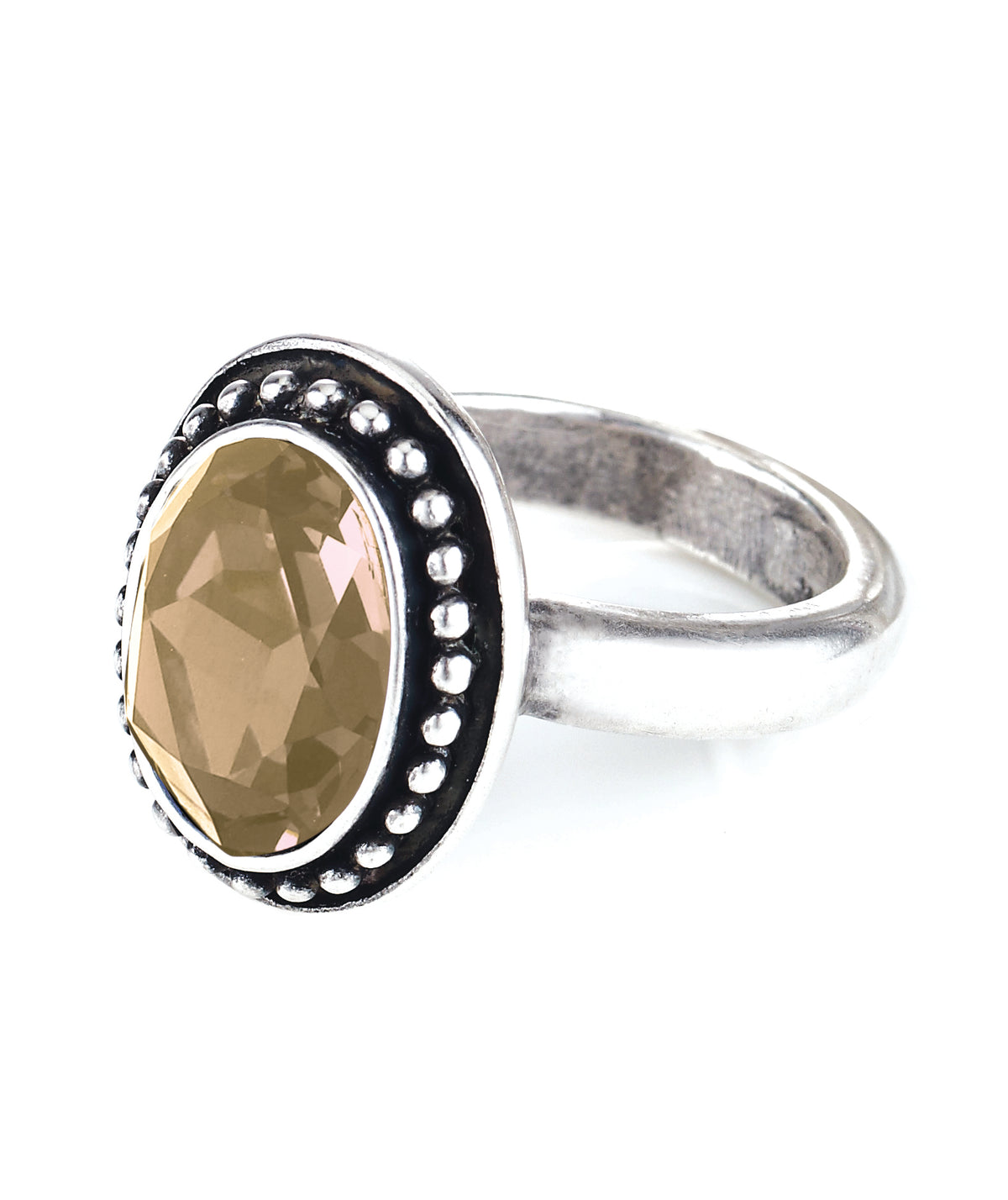 Silver ring with a Yellow (Golden Shadow) Swarovski Oval gemstone on a white background