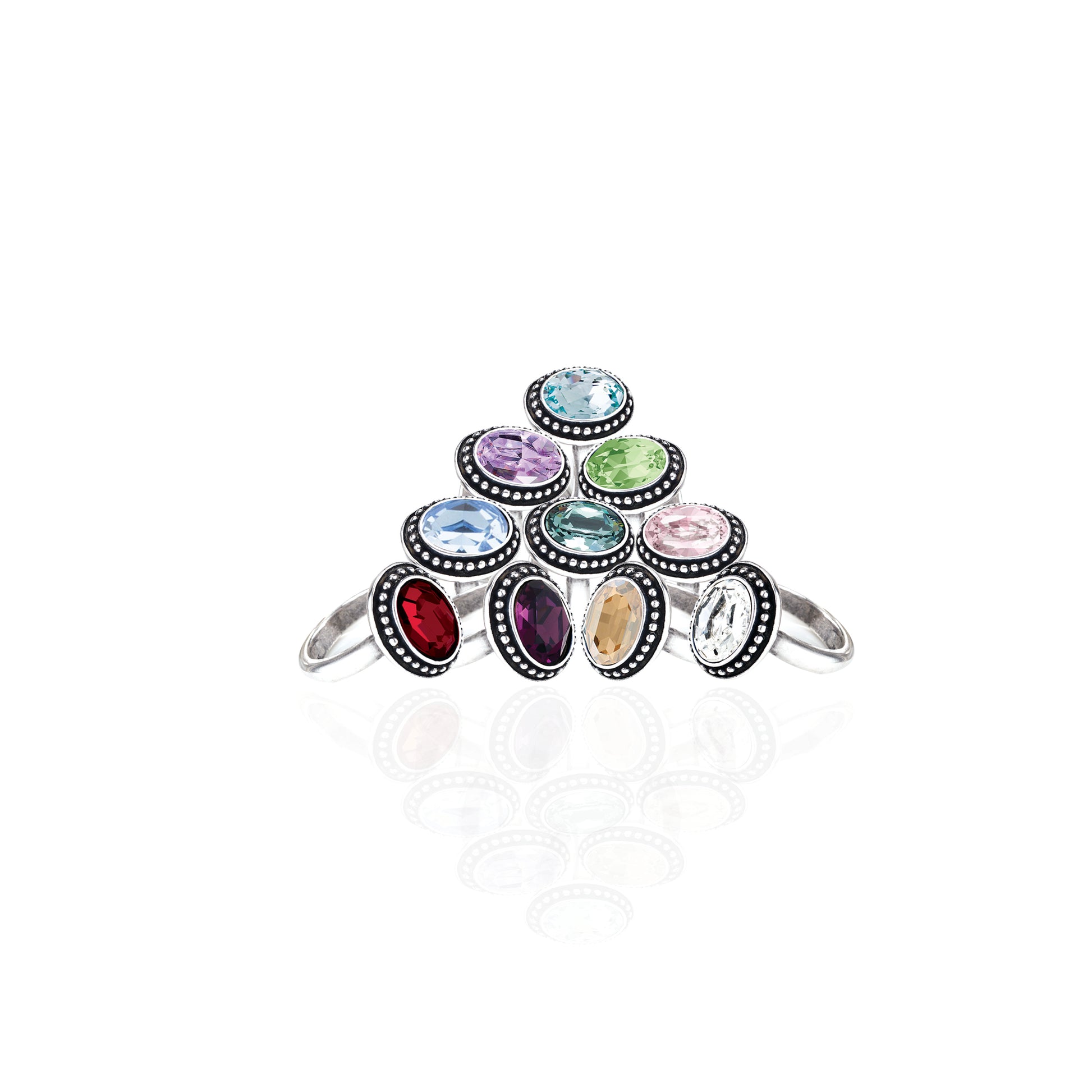 Ring with multicolored gemstones on a white background